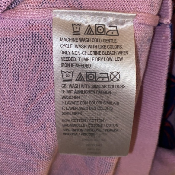 ISAAC MIZRAHI SZ XL . NWOT Sweater with floral design. One side is longer . - Picture 12 of 12